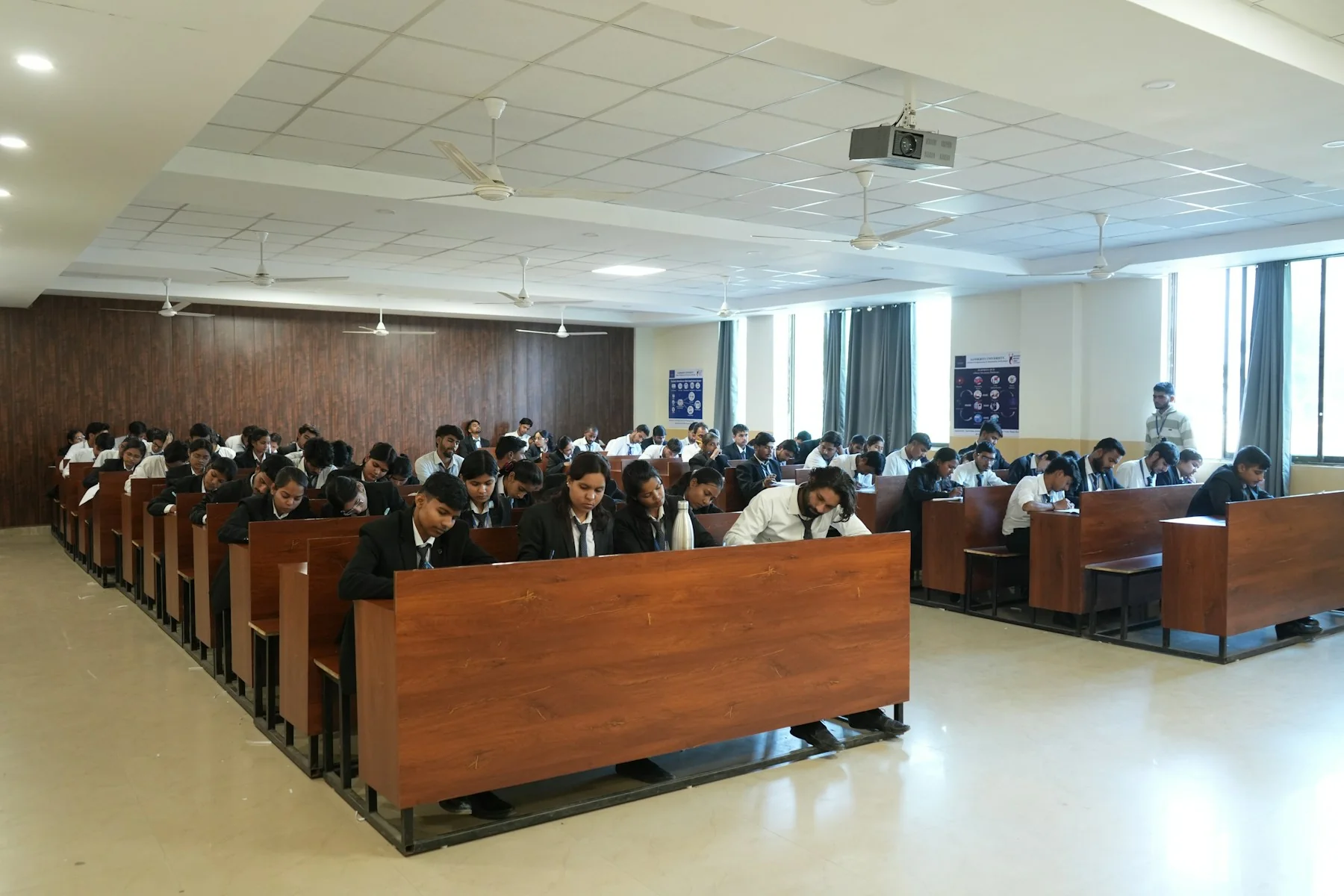 Students attending a lecture in a modern classroom