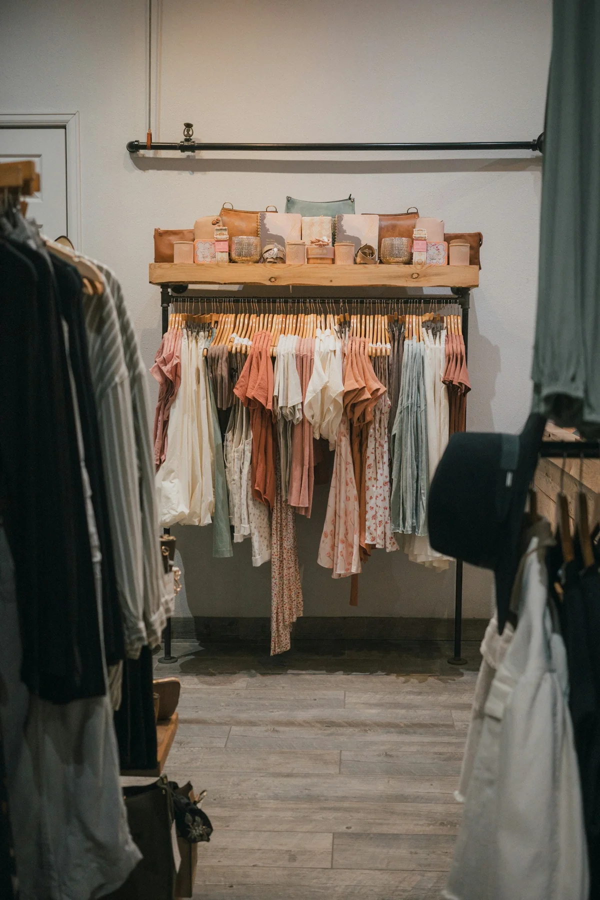 Racks of women's clothing displayed in a boutique Racks of women's clothing displayed in a boutique
