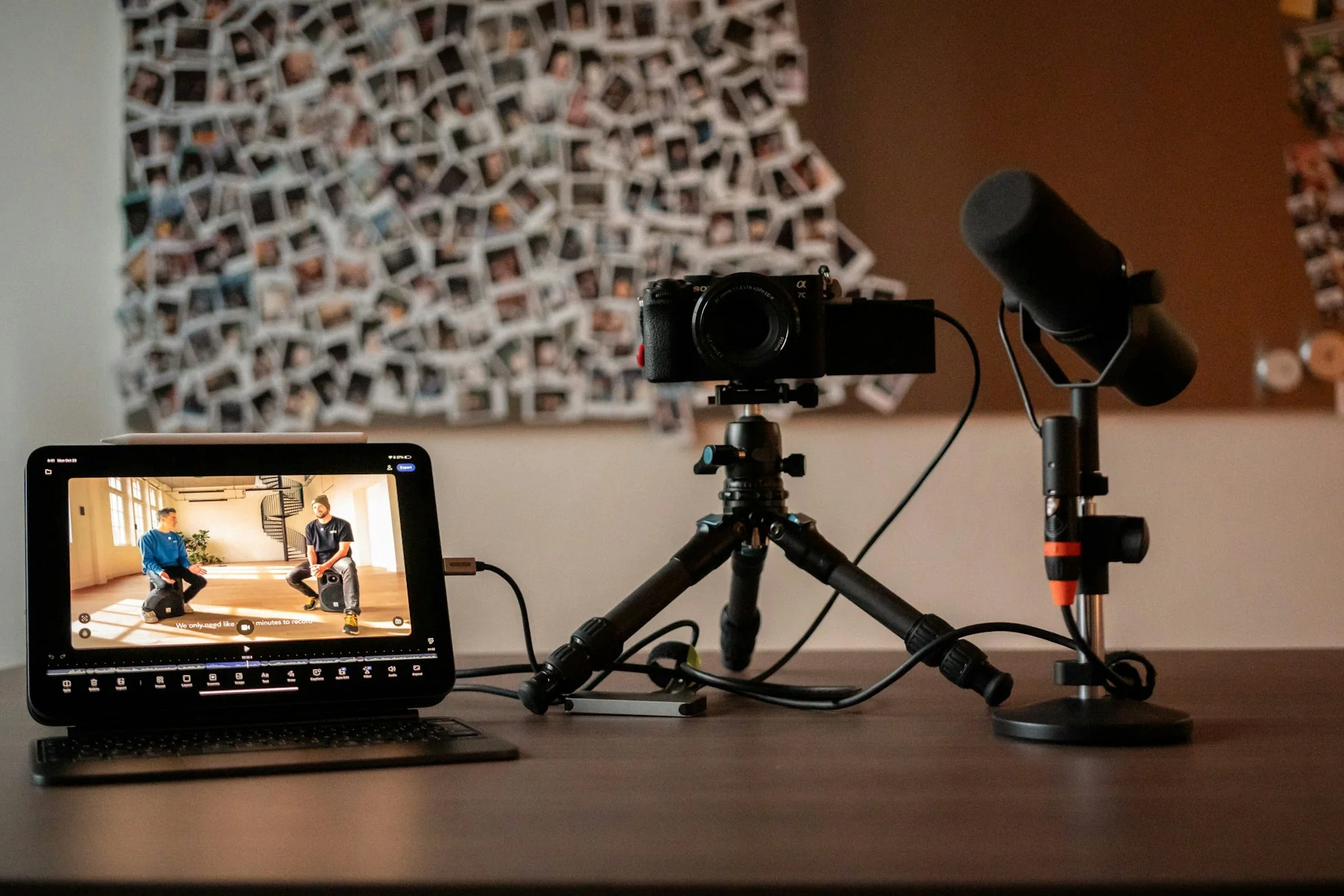 Camera, microphone, and monitor set up for a studio livestream/podcast